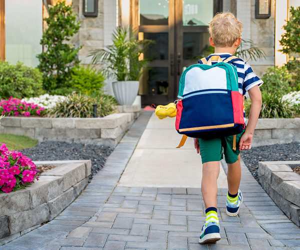Elyson resident walking to school