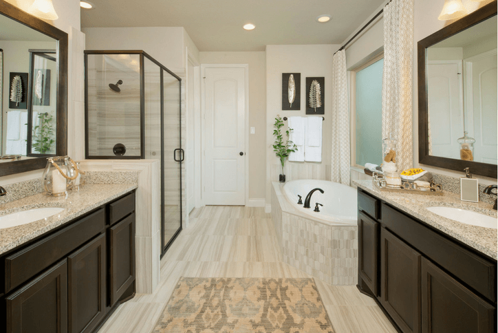 Primary bathroom in model home in Elyson