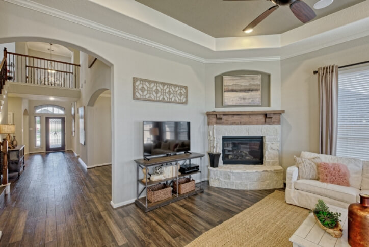 Chesmar model home fireplace in Elyson