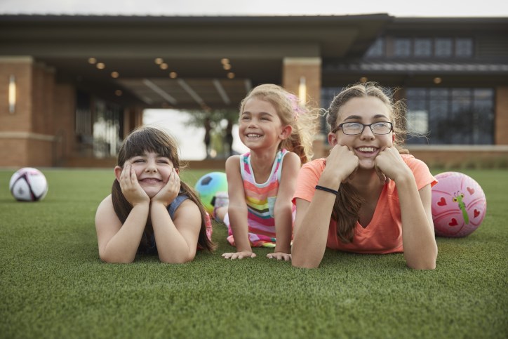 Kids having outdoor fun at Elyson House.