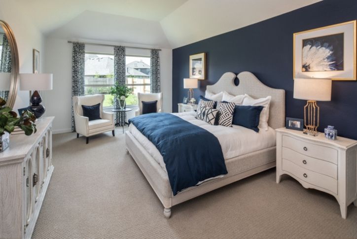 Highland Homes model home master bedroom in Elyson community Katy, TX