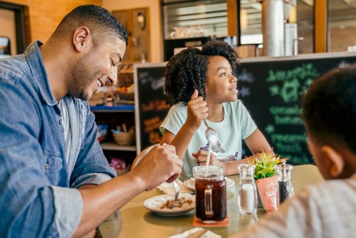 Dad and kids at Elyson Cafe