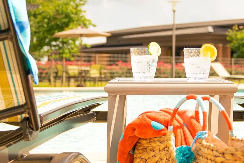 two beverages at the Elyson House swimming pool in Katy, Texas
