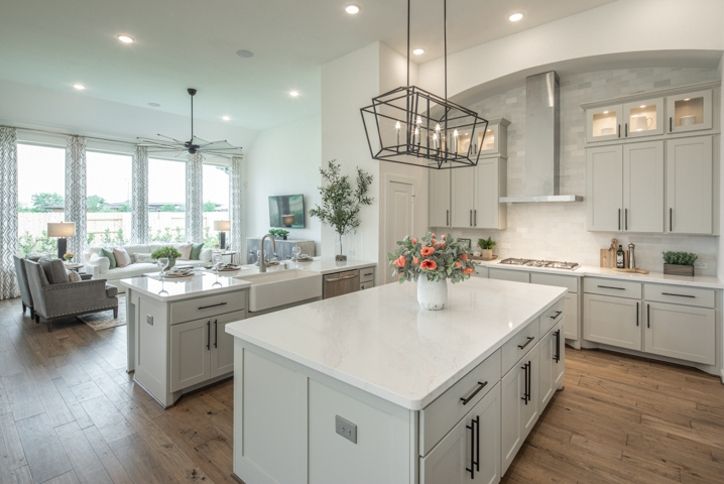 Farmhouse sink in open kitchen of Highland Homes model