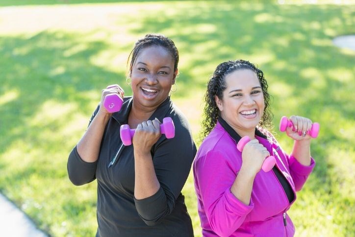 women working out with weights