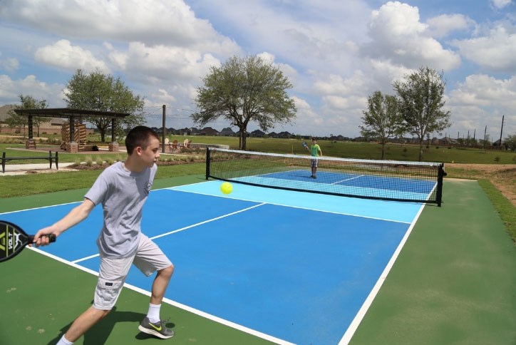 Elyson residents, the Brown family, enjoy pickleball.