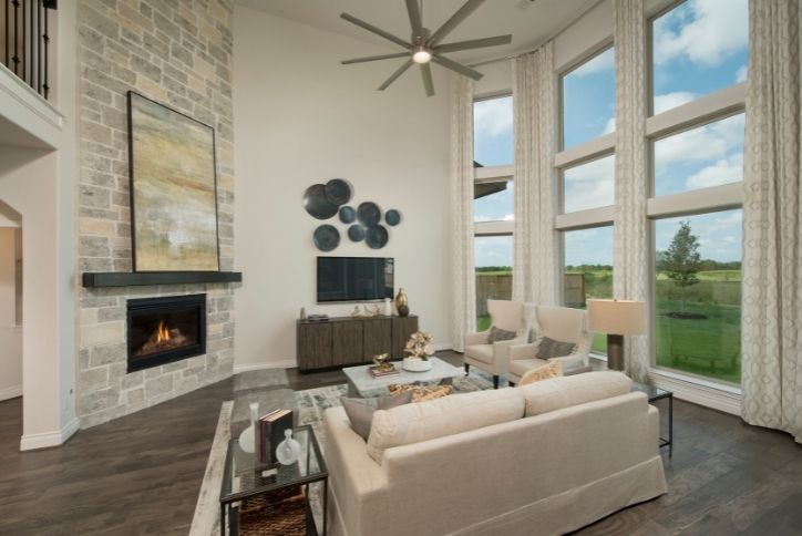 Living Room by Perry Homes in Elyson Community