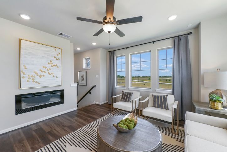 The Hawkins Fireplace by Chesmar Homes in Elyson community, Katy, Texas