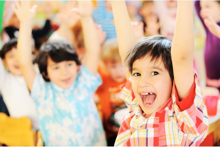Children cheering because Katy ISD named Number 1 school district by Niche for 2023
