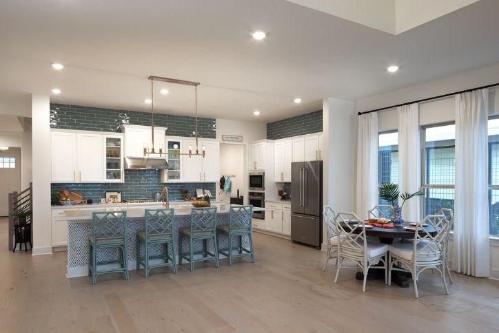 Brookfield Residential model home kitchen and dining in Elyson