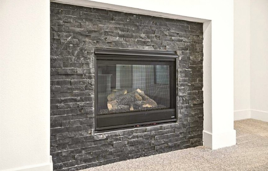 Westin 60 - 7510 Aster Thicket Trail - Fireplace.jpg