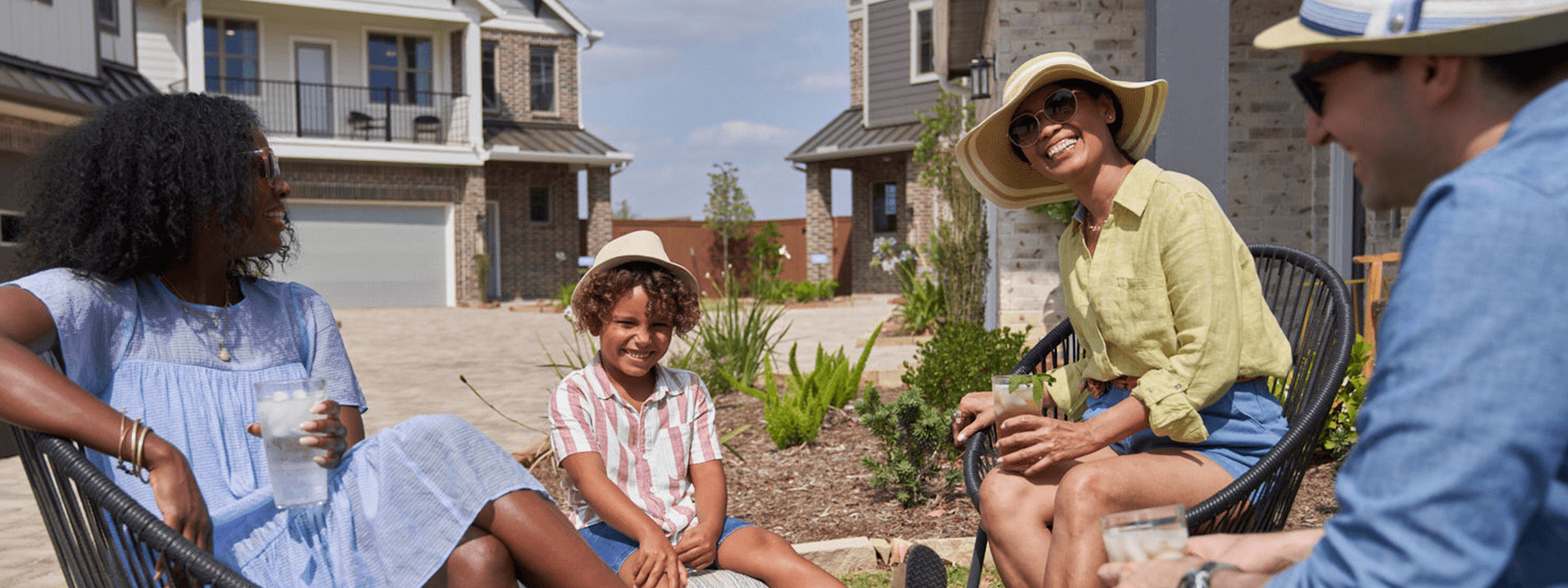 Neighboring family gathers outside Elyson homes