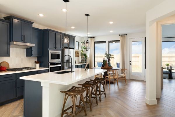 Brookfield Residential model home kitchen and breakfast room at Elyson