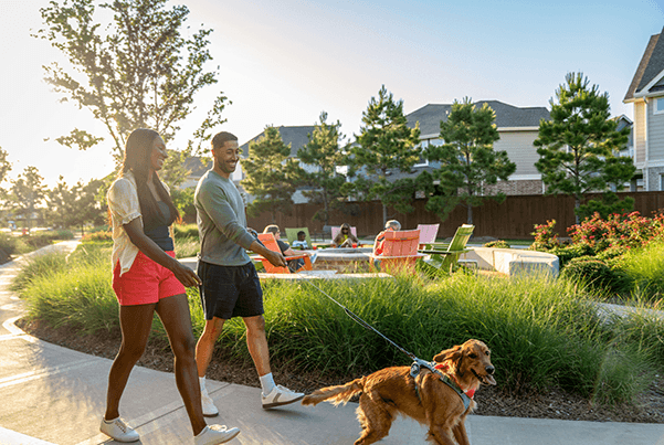 Couple With Dog Walking On Trails Elyson 2026 600Wl O