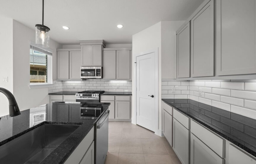 CC . 7615 Swooping Swallow Ln . Kitchen 2