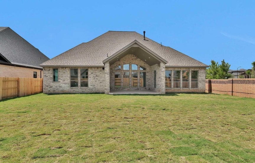 Perry 70 . 25006 Golden Tallgrass Dr . Backyard